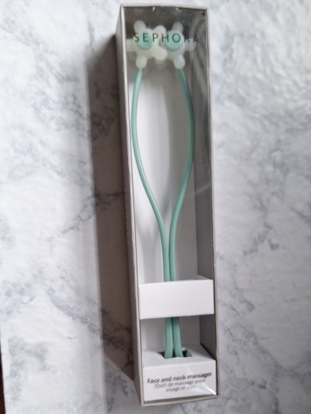 Sephora Mint Green Earbud-Style Face and Neck Massager